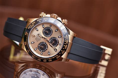 rolex daytona gold black dial rubber strap|rolex daytona vintage leather strap.